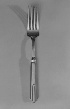 National Silver Company (1904-present). <em>Dinner Fork</em>, ca. 1935. Plastic, steel, 7 5/8 x 1 x 7/8 in. (19.4 x 2.5 x 2.2 cm). Brooklyn Museum, Gift of the E. F. Hauserman family, 83.105.1. Creative Commons-BY (Photo: Brooklyn Museum, 83.105.1_bw.jpg)