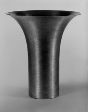 Russel Wright (American, 1904-1976). <em>Cylindrical Vase</em>, 1929-1935. Spun aluminum, 10 1/4 x 9 1/4 x 9 1/4 in. (26 x 23.5 x 23.5 cm). Brooklyn Museum, Gift of Paul F. Walter, 83.108.21. Creative Commons-BY (Photo: Brooklyn Museum, 83.108.21_bw.jpg)