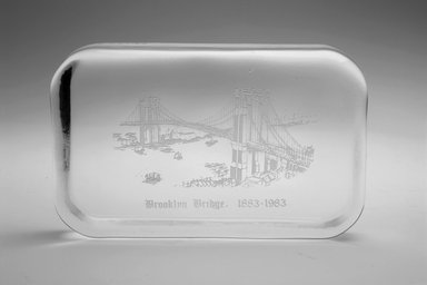 Unknown. <em>Paperweight (Brooklyn Bridge)</em>, 1983. Glass, 5/8 x 4 1/4 x 2 5/8 in. (1.6 x 10.8 x 6.7 cm). Brooklyn Museum, Ella C. Woodward Memorial Fund, 83.126.3. Creative Commons-BY (Photo: Brooklyn Museum, 83.126.3_bw_Justin_van_Soest_photograph.jpg)