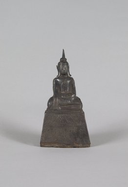  <em>Seated Buddha Shakyamuni</em>, 17th century. Wood and silver, H: 5 1/8 in. (13 cm). Brooklyn Museum, Gift of Dr. Joel Canter, 83.181.13. Creative Commons-BY (Photo: Brooklyn Museum, 83.181.13_PS5.jpg)