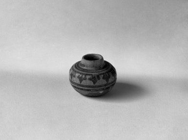  <em>Sawankhalok Miniature Jar, 5 of 5</em>, 14th century. Buff stoneware, H: 1 1/8 in. (2.9 cm). Brooklyn Museum, Gift of Dr. Joel Canter, 83.181.7. Creative Commons-BY (Photo: Brooklyn Museum, 83.181.7_bw.jpg)