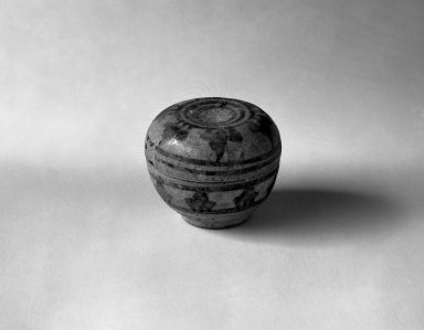  <em>Sawankhalok Miniature Covered Box</em>, 14th century. Stoneware, 1 1/2 x 1 3/4 in. (3.8 x 4.4 cm). Brooklyn Museum, Gift of Dr. Joel Canter, 83.181.9. Creative Commons-BY (Photo: Brooklyn Museum, 83.181.9_bw.jpg)