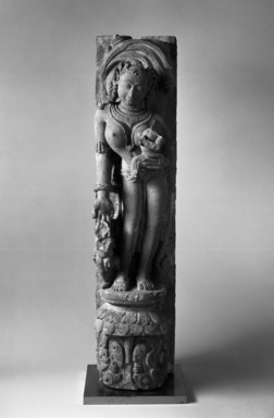 Bhubanesvara. <em>Jain Goddess Ambika</em>, 11th–12th century. Mottled sandstone, 33 x 7 7/8 in., 93 lb. (83.8 x 20 cm, 42.18kg). Brooklyn Museum, Gift of Georgia and Michael de Havenon, 83.182.1. Creative Commons-BY (Photo: Brooklyn Museum, 83.182.1_bw.jpg)