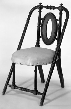 George Jacob Hunzinger (American, born Germany, 1835–1898). <em>Armchair</em>, ca. 1869. Walnut, 33 1/4 x 18 3/4 x 20 3/8 in. (84.5 x 47.6 x 51.8 cm). Brooklyn Museum, Gift of James Pilgrim, 83.226. Creative Commons-BY (Photo: Brooklyn Museum, 83.226_bw_IMLS.jpg)