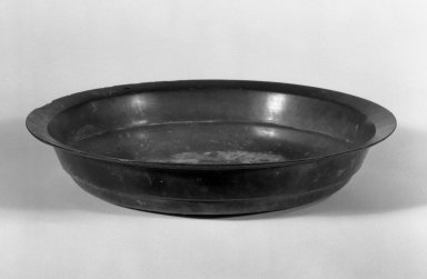  <em>Bowl</em>, 1st-2nd century C.E. Bronze, 1 5/8 x 8 1/2 in. (4.1 x 21.6 cm). Brooklyn Museum, Gift of Dr. Myron Arlen, 83.230.2. Creative Commons-BY (Photo: Brooklyn Museum, 83.230.2_bw.jpg)