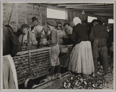 Lewis Wickes Hine (American, 1874-1940). <em>Oyster Shuckers,  Pass Christian, Mississippi</em>, 1911. Gelatin silver print, image: 10 1/2 x 13 1/2 in. (26.7 x 34.3 cm). Brooklyn Museum, Gift of Walter and Naomi Rosenblum, 84.237.9 (Photo: Brooklyn Museum, 84.237.9_PS20.jpg)