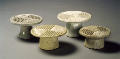  <em>Rice-Cake Mold</em>, 19th century. Porcelain with glaze, a: 1 3/4 x 1 5/16 in. (4.4 x 3.4 cm). Brooklyn Museum, Gift of Dr. and Mrs. John P. Lyden, 84.261.6. Creative Commons-BY (Photo: , 84.261.6-.9.jpg)