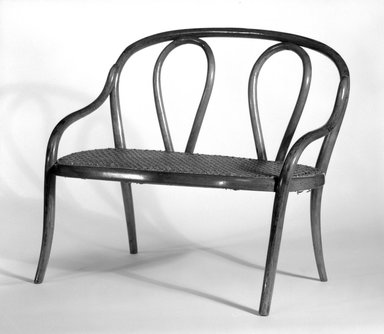 Gebrüder Thonet (Austrian, founded Vienna, 1842). <em>Settee for Dolls</em>, mid 1880's. Copper beech, modern caning, 12 1/4 x 14 1/4 x 9 1/4 in. (31.1 x 36.2 x 23.5 cm). Brooklyn Museum, Gift of Dr. Barry R. Harwood, 84.277. Creative Commons-BY (Photo: Brooklyn Museum, 84.277_bw.jpg)