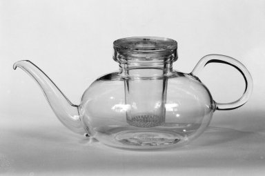 Wilhelm Wagenfeld (1900-1990). <em>Teapot</em>, 1930-1934. Glass, Other: 4 1/8 x 9 3/4 x 5 1/2 in. (10.5 x 24.8 x 14 cm). Brooklyn Museum, Gift of Barry Friedman, 84.64.1. Creative Commons-BY (Photo: Brooklyn Museum, 84.64.1_bw.jpg)