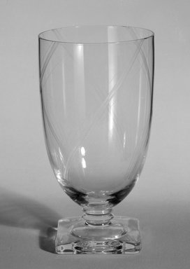 George Sakier (American, 1897-1988). <em>Glass, One of Pair</em>, ca. 1930. Molded glass, height: 5 in. (12.7 cm). Brooklyn Museum, Gift of Paul F. Walter, 85.158.3. Creative Commons-BY (Photo: Brooklyn Museum, 85.158.3_mark_bw.jpg)