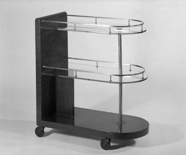 Gilbert Rohde (American, 1894–1944). <em>Serving Cart, Model 3321</em>, ca. 1933. Wood, metal, glass, rubber, 33 1/4 x 15 x 30 3/4 in. (84.5 x 38.1 x 78.1 cm). Brooklyn Museum, H. Randolph Lever Fund, 85.160.2. Creative Commons-BY (Photo: Brooklyn Museum, 85.160.2_bw.jpg)