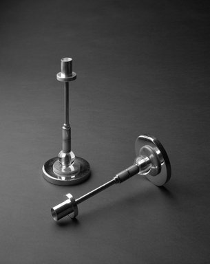 M. Goldsmith Company. <em>Candlestick, One of Pair</em>, ca. 1930s. Chrome-plated metal, plastic, 10 x 4 1/4 x 4 1/4 in. (25.4 x 10.8 x 10.8 cm). Brooklyn Museum, H. Randolph Lever Fund, 85.163.1. Creative Commons-BY (Photo: , 85.163.1_85.163.2_view3_bw.jpg)