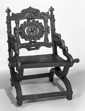 Asante. <em>Chair (Akonkromfi)</em>, 19th century. Wood, copper alloy, leather, 32 1/2 x 23 x 27 in.  (82.6 x 58.4 x 68.6 cm). Brooklyn Museum, Purchased with funds given by Marcia and John  Friede, Dr. and Mrs. Abbott A. Lippman, Mr. and Mrs. Milton F. Rosenthal and Carll H. de Silver Fund, 85.200.2. Creative Commons-BY (Photo: Brooklyn Museum, 85.200.2_bw.jpg)