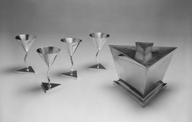 Elsa Tennhardt (American, born Germany, 1899–1980). <em>Stem Glass, Part of Five-piece Set</em>, Patented 1928. Silver-plated brass, 4 7/8 x 2 3/4 x 2 3/4 in. (12.4 x 7 x 7 cm). Brooklyn Museum, Designated Purchase Fund, 85.213.4. Creative Commons-BY (Photo: , 85.213.2a-b-.6_bw.jpg)