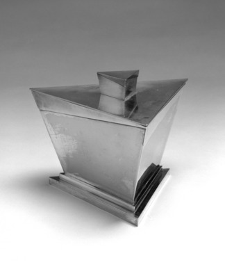 Elsa Tennhardt (American, born Germany, 1899-1980). <em>Ice Bucket, Part of Five-piece Set</em>, Patented 1928. Silver-plated brass, brass, 6 x 8 1/4 x 7 1/4 in. (15.2 x 21 x 18.4 cm). Brooklyn Museum, Designated Purchase Fund, 85.213.2a-b. Creative Commons-BY (Photo: Brooklyn Museum, 85.213.2a-b_bw.jpg)