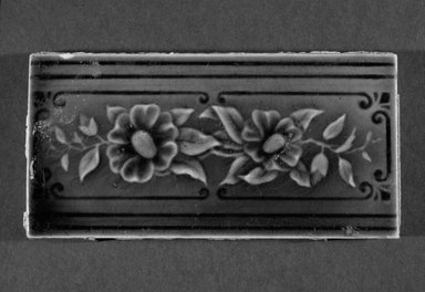 International Tile Company. <em>Tile</em>, 1882-1888. Earthenware, 3 × 6 × 1/2 in. (7.6 × 15.2 × 1.3 cm). Brooklyn Museum, Gift of Florence I. Barnes, 85.6.10. Creative Commons-BY (Photo: Brooklyn Museum, 85.6.10_bw.jpg)