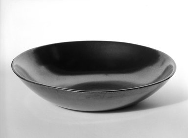 Eva Zeisel (American, born Hungary, 1906-2011). <em>Bowl</em>, designed c. 1945-produced c. 1946. Glazed earthenware, 1 3/4 x 7 1/8 in. (4.4 x 18.1 cm). Brooklyn Museum, Gift of Eva Zeisel, 85.75.14. Creative Commons-BY (Photo: Brooklyn Museum, 85.75.14_bw.jpg)