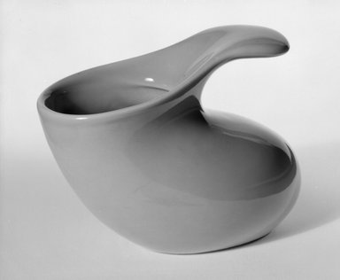 Eva Zeisel (American, born Hungary, 1906-2011). <em>Baby Feeding Cup</em>, ca. 1940. Glazed earthenware, 3 x 4 x 3 in. (7.6 x 10.2 x 7.6 cm). Brooklyn Museum, Gift of the artist, 85.75.1. Creative Commons-BY (Photo: Brooklyn Museum, 85.75.1_bw.jpg)
