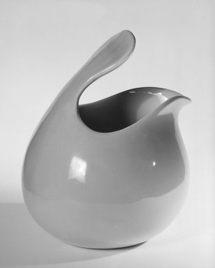 Red Wing Pottery (active 1936-1967). <em>Pitcher</em>, designed c. 1945-produced c.1946. Glazed earthenware, 8 x 7 x 7 in. (20.3 x 17.8 x 17.8 cm). Brooklyn Museum, Gift of Eva Zeisel, 85.75.7. Creative Commons-BY (Photo: Brooklyn Museum, 85.75.7_bw.jpg)