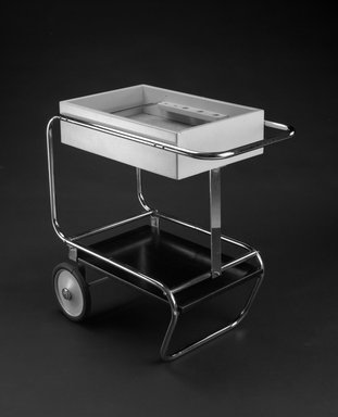 Gilbert Rohde (American, 1894-1944). <em>Beverage Cart</em>, ca. 1933. Chrome-plated steel, painted wood, cork, 33 x 33 3/4 x 18 3/4 in. (83.8 x 85.7 x 47.6 cm). Brooklyn Museum, H. Randolph Lever Fund, 85.77. Creative Commons-BY (Photo: Brooklyn Museum, 85.77_view2_bw.jpg)