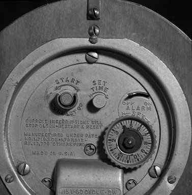 Gilbert Rohde (American, 1894-1944). <em>Clock</em>, ca. 1935. Burled veneer over maple (?), metal, 7 x 6 x 2 3/4 in. (17.8 x 15.2 x 7 cm). Brooklyn Museum, H. Randolph Lever Fund, 85.78.1. Creative Commons-BY (Photo: Brooklyn Museum, 85.78.1_mark_bw.jpg)