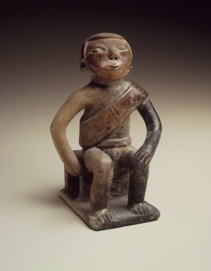  <em>Coquero  (Figure Chewing Coca)</em>, 850-1500 C.E. Clay, slip, 7 x 4 3/4 in.  (17.8 x 12.1 cm). Brooklyn Museum, Gift of Jonathan, Peter, and Timothy Zorach, 86.107.9. Creative Commons-BY (Photo: Brooklyn Museum, 86.107.9.jpg)
