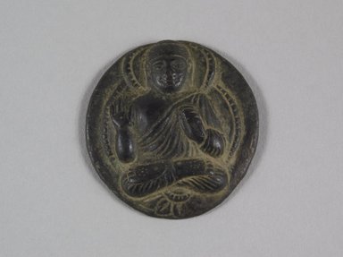  <em>Medallion with Buddha Image</em>, 6th-7th century. Bronze, 4.1 cm (4.1 cm). Brooklyn Museum, Gift of Dr. and Mrs. Robert Feinberg, 86.134.1. Creative Commons-BY (Photo: Brooklyn Museum, 86.134.1_PS5.jpg)