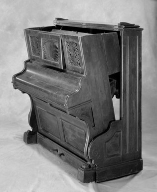 Smith & Co.. <em>Convertible Bed in Form of Upright Piano</em>, ca. 1885. Ebonized woods, metal, 55 1/2 x 54 3/4 x 27 in. (141 x 139.1 x 68.6 cm). Brooklyn Museum, Gift of Elinor Merrell, 86.176. Creative Commons-BY (Photo: Brooklyn Museum, 86.176_threequarter_bw.jpg)