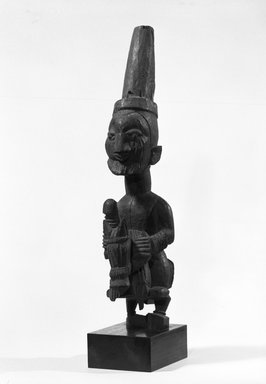 Yorùbá. <em>Male Equestrian Figure</em>, late 19th or early 20th century. Wood, 15 3/4 tall ( with stand)x 3 5/8 in. (40.0 x 9.2 cm) at shoulders. Brooklyn Museum, Gift of the Ernest Erickson Foundation, Inc., 86.224.150. Creative Commons-BY (Photo: Brooklyn Museum, 86.224.150_bw.jpg)