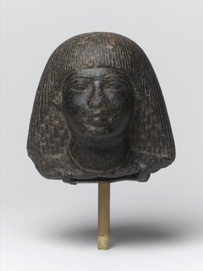  <em>Head and Bust of an Official in a Double Wig</em>, ca. 1390–1352 B.C.E. Red granite, 4 1/2 x 4 9/16 x 3 3/4 in. (11.4 x 11.6 x 9.6 cm). Brooklyn Museum, Gift of the Ernest Erickson Foundation, Inc., 86.226.28. Creative Commons-BY (Photo: Brooklyn Museum, 86.226.28_PS2.jpg)