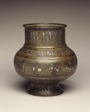  <em>Jug (Mashraba) with Human-Headed Inscription and Zodiac Signs</em>, late 12th–early 13th century. Copper alloy, engraved, inlaid and overlaid with silver, height: 5 1/2 in. (14 cm). Brooklyn Museum, Gift of the Ernest Erickson Foundation, Inc., 86.227.123. Creative Commons-BY (Photo: Brooklyn Museum, 86.227.123_SL1.jpg)