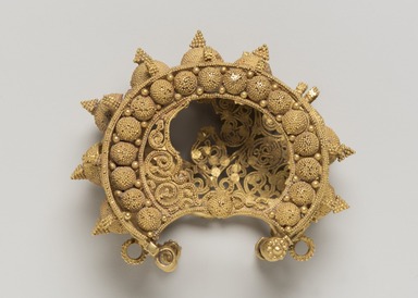  <em>Earring</em>, 11th–12th century. Gold (unconfirmed), wire and sheet, granulated and filigree decoration, 1 1/2 x 1 7/8 x 7/8 in. (3.8 x 4.8 x 2.2 cm). Brooklyn Museum, Gift of the Ernest Erickson Foundation, Inc., 86.227.127. Creative Commons-BY (Photo: Brooklyn Museum, 86.227.127_view01_PS11.jpg)