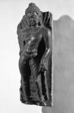  <em>Standing Buddha</em>, ca. late 9th century. Black chlorite, 21 3/4 x 7 3/4in. (55.2 x 19.7cm). Brooklyn Museum, Gift of the Ernest Erickson Foundation, Inc., 86.227.205. Creative Commons-BY (Photo: Brooklyn Museum, 86.227.205_bw.jpg)