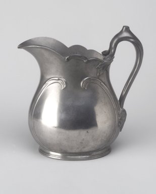 Reed & Barton (American, 1840-present). <em>Pitcher</em>, ca. 1908. Pewter, 8 1/4 x 8 x 4 1/2 in. (21 x 20.3 x 11.4 cm). Brooklyn Museum, Gift of Emma and Jay Lewis, 87.174. Creative Commons-BY (Photo: Brooklyn Museum, 87.174.jpg)