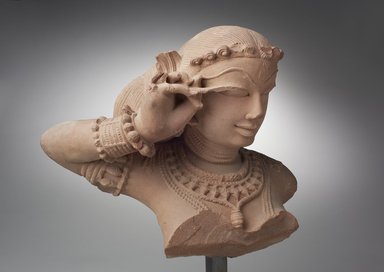  <em>Female Bust</em>, 11th-12th century. Sandstone, 12 x 11 3/4 x 9 1/2 in. (30.5 x 29.8 x 24.1 cm). Brooklyn Museum, Gift of Georgia and Michael de Havenon, 87.188.3. Creative Commons-BY (Photo: Brooklyn Museum, 87.188.3_threequarter_right_PS11.jpg)