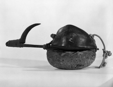 Hawaiian. <em>Octopus Lure (Lūhe‘e)</em>. Cowrie shell, stone, wood, shell, fiber, 8 x 3 1/8 x 4in. (20.3 x 7.9 x 10.2cm). Brooklyn Museum, Gift of Marcia and John Friede and Mrs. Melville W. Hall, 87.218.103. Creative Commons-BY (Photo: Brooklyn Museum, 87.218.103_bw.jpg)