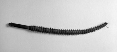 Kiribati. <em>Dagger</em>. Wood, coir, tigershark teeth, 20 1/8 x 1 1/2 x 1/2 in. (51.1 x 3.8 x 1.3 cm). Brooklyn Museum, Gift of Marcia and John Friede and Mrs. Melville W. Hall, 87.218.114. Creative Commons-BY (Photo: Brooklyn Museum, 87.218.114_bw.jpg)