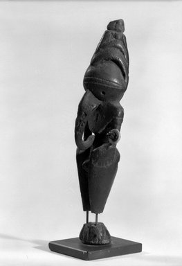  <em>Figure</em>. Wood, straw, shell, 6 3/8 x 1 5/8 x 1 5/8 in. (16.2 x 4.1 x 4.1 cm). Brooklyn Museum, Gift of Marcia and John Friede and Mrs. Melville W. Hall, 87.218.34. Creative Commons-BY (Photo: Brooklyn Museum, 87.218.34_bw.jpg)