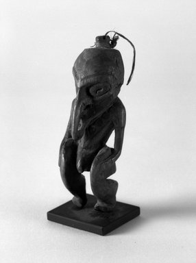  <em>Figure</em>. Wood, fiber, 4 3/4 x 1 3/4 x 1 1/2 in. (12.1 x 4.4 x 3.8 cm). Brooklyn Museum, Gift of Marcia and John Friede and Mrs. Melville W. Hall, 87.218.38. Creative Commons-BY (Photo: Brooklyn Museum, 87.218.38_bw.jpg)
