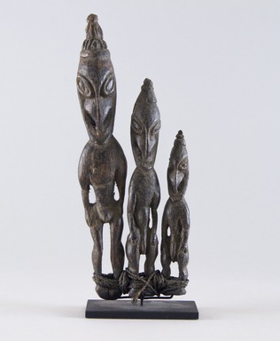  <em>Amulet Figures</em>. Wood,  twine, 8 x 2 1/16 x 3/4 in. (20.3 x 5.2 x 1.9 cm). Brooklyn Museum, Gift of Marcia and John Friede and Mrs. Melville W. Hall, 87.218.40. Creative Commons-BY (Photo: Brooklyn Museum, 87.218.40_front_PS8.jpg)