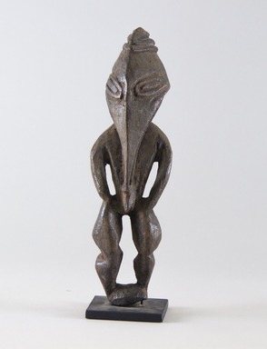  <em>Figure</em>. Wood, ochre, 8 1/4 x 2 1/2 x 2 1/4 in. (21 x 6.4 x 5.7 cm). Brooklyn Museum, Gift of Marcia and John Friede and Mrs. Melville W. Hall, 87.218.69. Creative Commons-BY (Photo: Brooklyn Museum, 87.218.69_front_PS8.jpg)