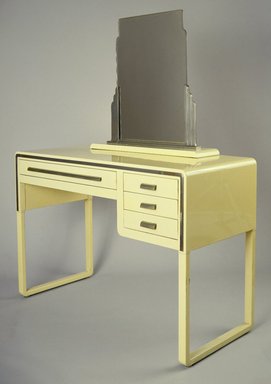Norman Bel Geddes (American, 1893-1958). <em>Table-top Mirrror in Stand from Bedroom Set</em>, 1929-1932. Enameled steel, chrome-plated metal, brass, wood, Stand: 13 x 27 1/2 x 6 1/2 in. (33 x 69.9 x 16.5 cm). Brooklyn Museum, Anonymous gift in memory of Benjamin Linder, 87.221.4a-c. Creative Commons-BY (Photo: , 87.221.3_87.221.4a-c_SL3.jpg)