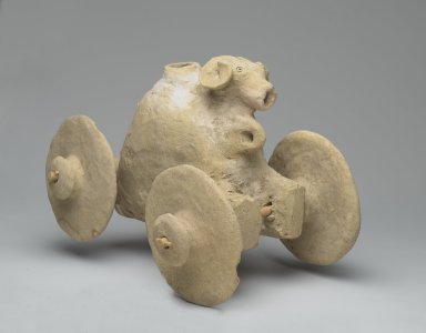 Mesopotamian. <em>Wheeled Ram-Headed Vessel</em>, second half 3rd millenium B.C.E. Terracotta, 9 x 4 x 9 in. (22.9 x 10.2 x 22.9 cm). Brooklyn Museum, Purchased with funds given by Shelby White, 87.77. Creative Commons-BY (Photo: Brooklyn Museum, 87.77_threequarter_right_PS2.jpg)