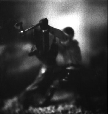 David Levinthal (American, born 1949). <em>Untitled (Cowboy and Indian Fighting)</em>, 1987. Photomechanical reproduction, acrylic on canvas, 40 x 38 1/2 in. (101.6 x 97.8 cm). Brooklyn Museum, Gift of David, Judith, Michael, and Daniel Levinthal in honor of their parents, Rhoda and Elliot, 88.130.2. © artist or artist's estate (Photo: Brooklyn Museum, 88.130.2_bw.jpg)