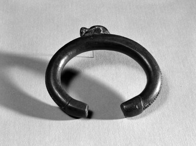 Senufo. <em>Bracelet with One Animal Form</em>, late 19th or early 20th century. Copper alloy, h: 3/8 in. (1.7 cm). Brooklyn Museum, Gift of Arthur Dintenfass, 88.187.4. Creative Commons-BY (Photo: Brooklyn Museum, 88.187.4_bw.jpg)