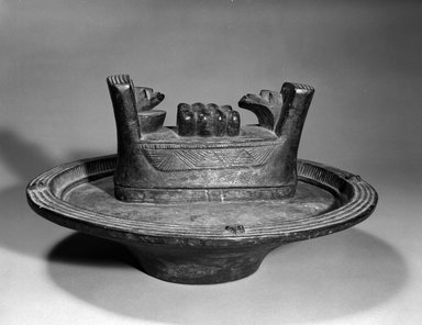 Nupe. <em>Kola Bowl</em>, early 20th century. Wood, height: 8 1/2 in. (21.6 cm) diam: 15 3/4 in. (40.0 cm). Brooklyn Museum, Gift of Gerald and Leona Shapiro, 88.191.2. Creative Commons-BY (Photo: Brooklyn Museum, 88.191.2_bw.jpg)