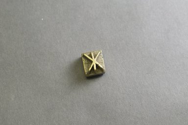 Akan. <em>Gold-weight (abrammuo): geometric</em>, 19th-20th century. Copper alloy, 3/8 x 1/2 x 5/8 in. (1 x 1.3 x 1.6 cm). Brooklyn Museum, Gift of Mr. and Mrs. Franklin H. Williams, 88.192.110. Creative Commons-BY (Photo: Brooklyn Museum, 88.192.110_front_PS5.jpg)