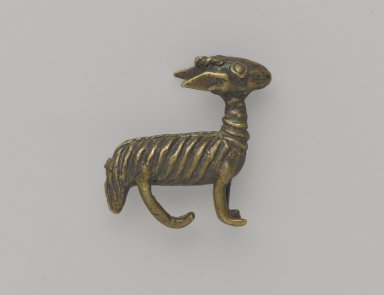 Akan. <em>Gold-weight (abrammuo): animal</em>, 19th–20th century. Cast brass, 1 1/8 x 3/8 x 1 1/8in. (2.9 x 1 x 2.9cm). Brooklyn Museum, Gift of Mr. and Mrs. Franklin H. Williams, 88.192.127. Creative Commons-BY (Photo: Brooklyn Museum, 88.192.127_PS6.jpg)