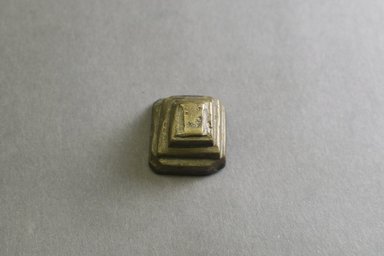 Akan. <em>Gold-weight (abrammuo): geometric</em>, 19th-20th century. Copper alloy, 1 x 1 x 3/4 in. Brooklyn Museum, Gift of Mr. and Mrs. Franklin H. Williams, 88.192.133. Creative Commons-BY (Photo: Brooklyn Museum, 88.192.133_top_PS5.jpg)