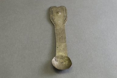 Akan. <em>Gold Dust Spoon</em>, 19th-20th century. Hammered metal, 4 7/8 x 1 1/8 x 1/4 in. Brooklyn Museum, Gift of Mr. and Mrs. Franklin H. Williams, 88.192.27. Creative Commons-BY (Photo: Brooklyn Museum, 88.192.27_front_PS5.jpg)